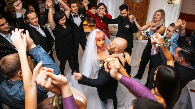 Kazakh bodybuilder Yuri Tolcho and sexy doll Margo's wedding photo from: FACEBOOK